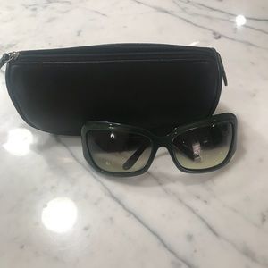 Oliver People’s green sunglasses